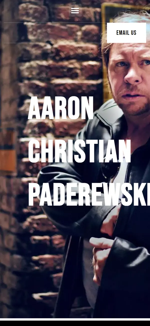 Aaron Christian Paderewski on a phone